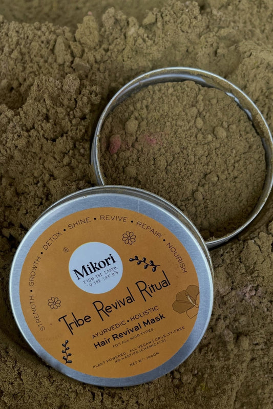 Mikori Tribe Revival Ritual hair mask container on a sandy background
